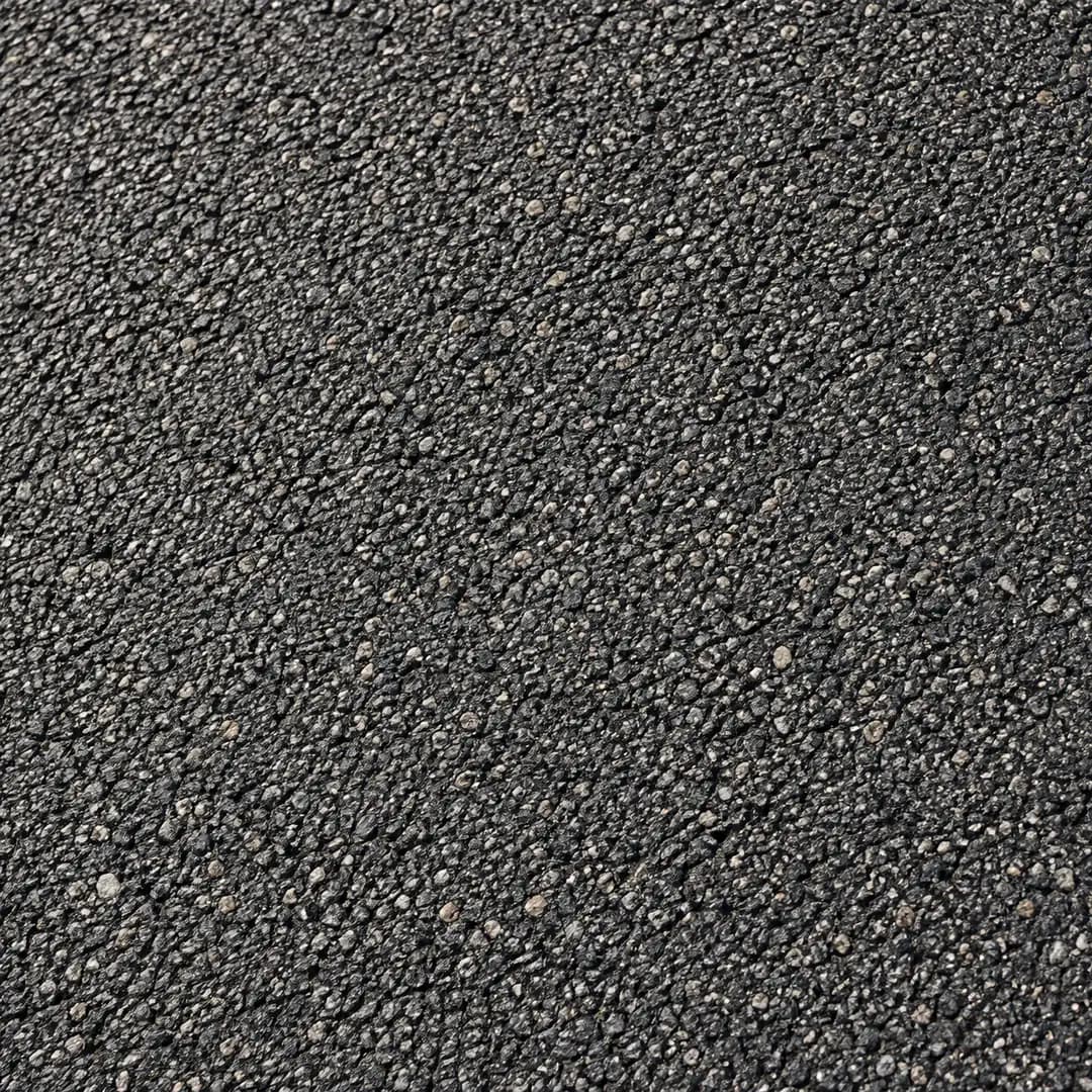 Close view of the aggregate texture in asphalt